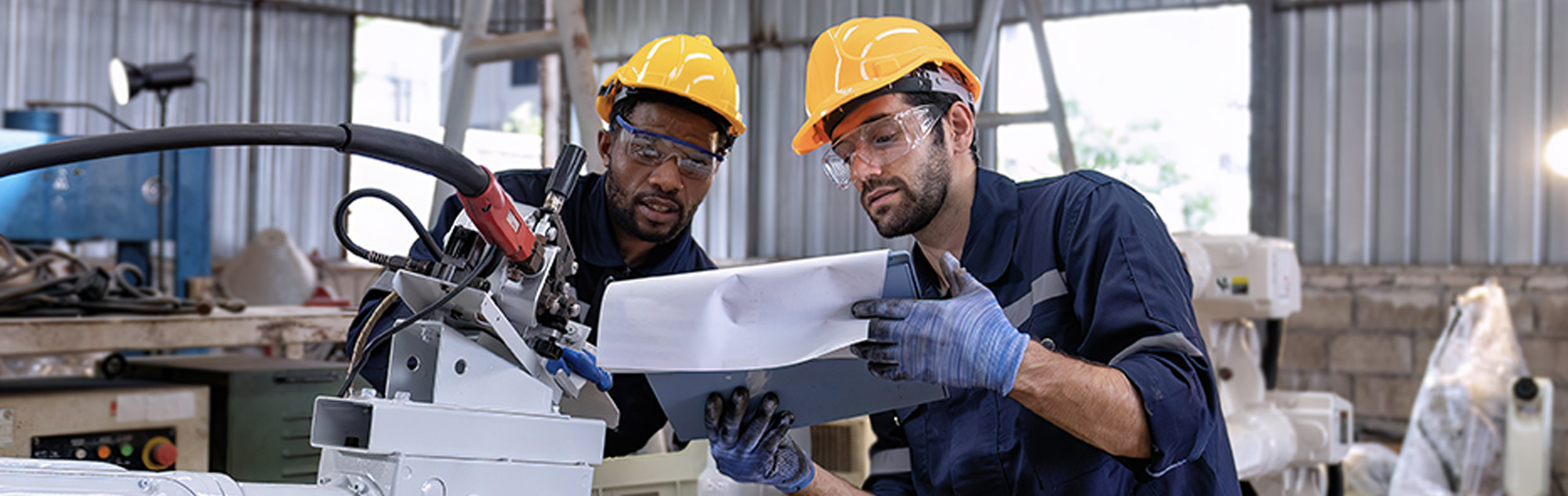 Two men in hard hats.